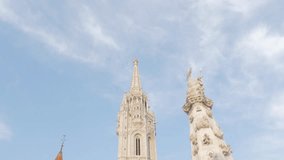 Matthias church and fountain nearby on Buda hill in Budapest 4K 2160p UltraHD footage  - Matyas-templom in Budapest Hungary on Budas Castle District 4K 3840X2160 UHD video