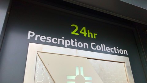 Bebington, UK, April 17th 2022:A new 24-hour automated prescription collection service in Bebington and the Wirral. The Prescription Collection sign. The Pharmacy, 176 Bebington Road CH63 7PD.