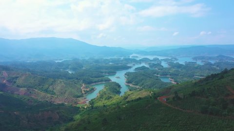 Aerial view of Ta Dung lake in early morning, which is as known as Ha Long bay on land of Vietnam central highland. The reservoir for power generation by hydro power in Dak Nong province, Vietnam.