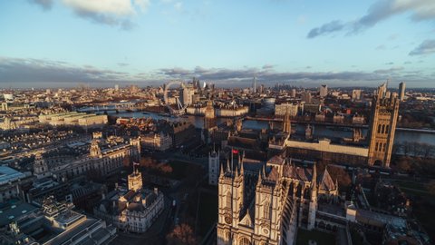 British Parliament Palace of Westminster, late day, Establishing Aerial View Shot of London UK, United Kingdom