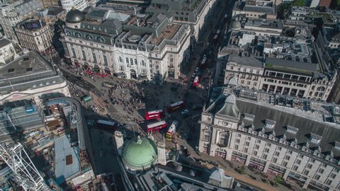 Busy Piccadilly Circus, day sunny, Establishing Aerial View Shot of London UK, United Kingdom