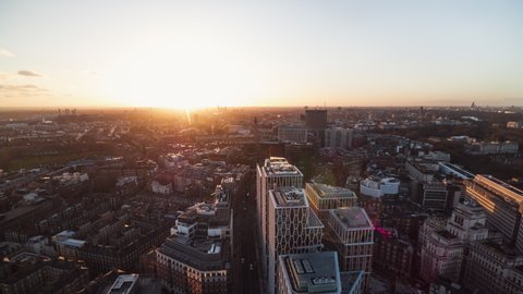Last rays of sun over Westminster, Establishing Aerial View Shot of London UK, United Kingdom