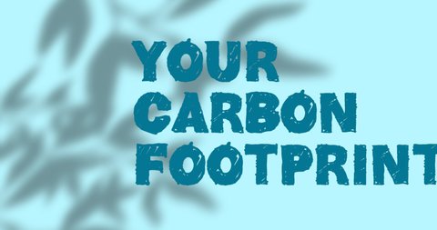 Animation of your carbon footprint text over shadow of plants on green background. ecology and recycling concept digitally generated video.