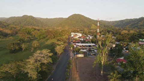 Small, rural town of Jaco on the tropical Pacific Coast of Costa Rica. Static wide angle aerial shot 