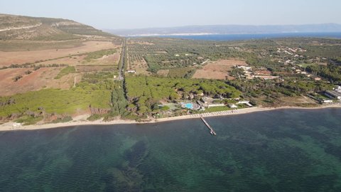 drone flight over the Porto Conte peninsula with its watchtower, in the gulf of Capo Caccia near Alghero