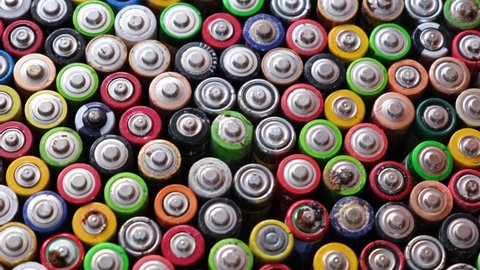 Top view of a group of used AA batteries. Alkaline batteries 