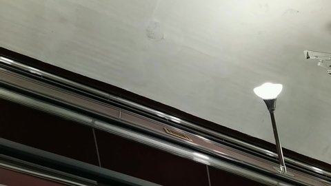 empty escalator movement in subway side view