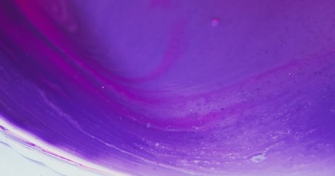 Color fluid wave. Ink water flow. Acrylic paint blend. Defocused neon purple pink blue liquid motion abstract art background