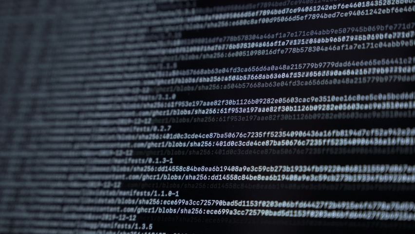 The monitor screen on which lines with a digital code move. Server hacker attack. Encrypted digital data. Cyber ​​crime, digital security. Shallow depth of field. | Shutterstock HD Video #1089511035