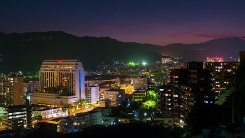 Nagasaki, Japan. A night timelapse made from a hill in Nagasaki, Japan, with over the entire center, including the hills. Time-lapse at night