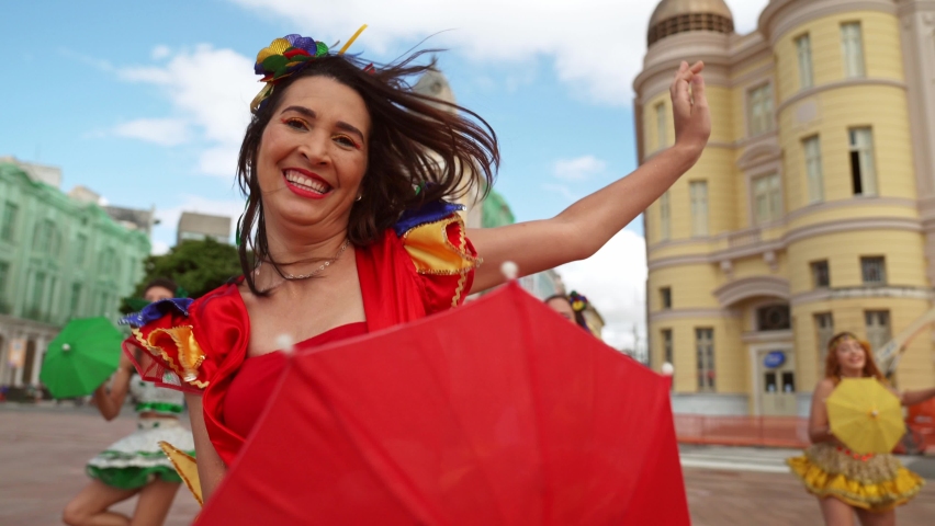 Frevo dancers at the street carnival in Recife, Pernambuco, Brazil. | Shutterstock HD Video #1089527105