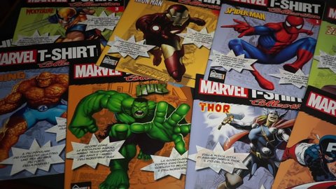 Rome, Italy - April 12, 2022, detail of Marvel comic book covers with datasheets inside, sold together with the t-shirts.