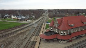 Durand, Michigan antique train depot with drone video moving sideways.