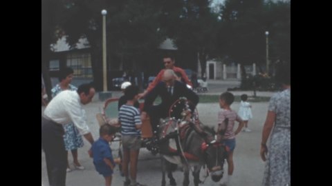 Ancona, Italy May 1959: Children carriage horse park in 50s