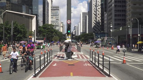 SAO PAULO, BRAZIL - MARCH 2022: Avenida Paulista or Paulista Avenue, one of the busiest and longest streets in Sao Paulo. It is closed to traffic and open to pedestrians every Sunday.
