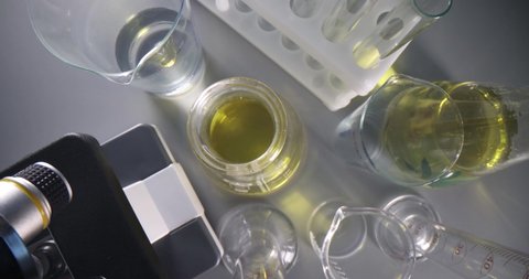 Transparent yellow oily liquid in test tube in laboratory