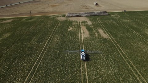 Chemical Field Treatment.Top View.Tractor Sprays Fertilizers. Grodno, Belarus