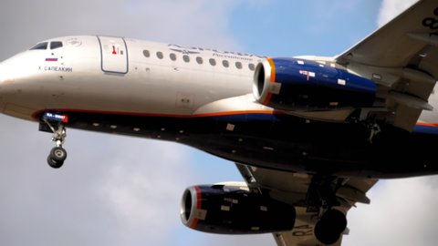 MOSCOW, RUSSIAN FEDERATION - SEPTEMBER 12, 2020: Sukhoi Superjet 100-95B of Aeroflot flies to land at Sheremetyevo airport (SVO). Aviation and travel concept