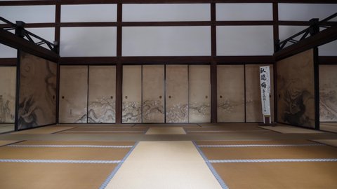 Kyoto, Japan - April 23, 22: Japanese empty room tatami mat. Modern zen living room Japanese style. Japanese style of living. High quality 4k footage.
