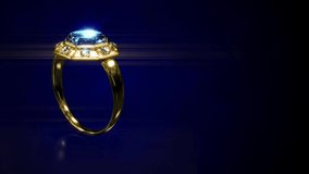 wedding golden ring with blue topaz rotate, fictive - loop video