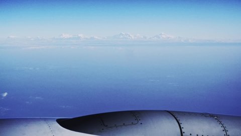 View on deep blue Himalaya mountain range with Everest mountain and aeroplanes engine. High quality 4k video.