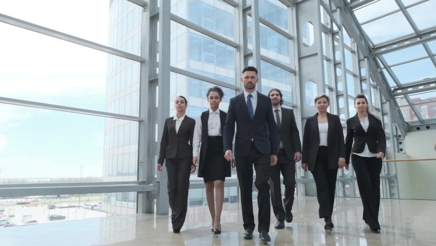Portrait of business people team standing with arms crossed in office | Shutterstock HD Video #1089559251