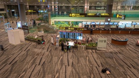 Singapore , Singapore - 04 21 2022: Timelapse Of People Inside The Changi Airport In Singapore