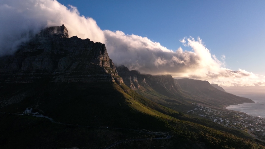 Clouds enveloping the Twelve Apostles at sunset, Cape Town; aerial