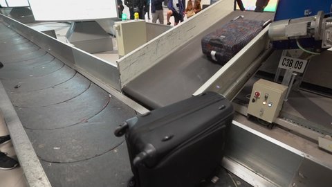 Marseille, France - April 28, 2019: Suitcase on luggage conveyor belt in the baggage claim at airport