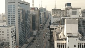 Aerial footage of Paulista avenue during the day with low volume of cars Sao Paulo, Brazil
