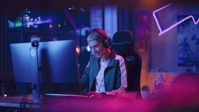 Frustrated Female Gamer Losing in Online Video Game on Computer. Portrait of Young Stylish Woman in Headphones Playing PvP Tournament with Other Players, Talking with Team on Microphone.