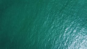 Sea view from above. Video for the background. Real view of the ocean from a drone. Calm waves and water