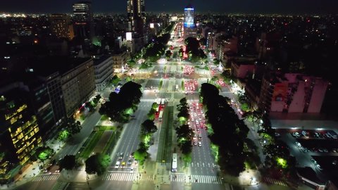 Buenos Aires, Buenos Aires, Argentina - 04.19.2022 - Panoramic aerial landscape of Obelisk at 9th July avenue at urban scenery of capital city of Argentina. Time lapse city. Time lapse traffic.