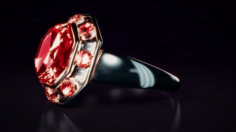Dark metal ring with red ruby jewel rotates, isolated, fictitious - loop video