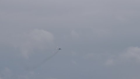 Zeltweg Austria SEPTEMBER, 6, 2019 Warsaw Pact military plane in flight at high speed in cloudy sky. Sukhoi Su-22 Fitter of Polish Air Force the first variable-sweep wing aircraft of Soviet Union.