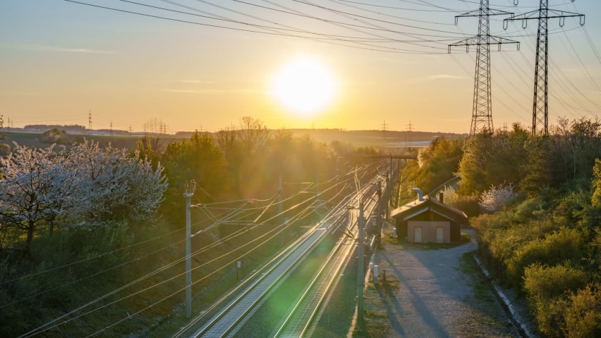 Timelapse at sunset - the rapid railway transit route between Stuttgart and Mannheim is one of the most important railway connections in Germany  Royalty-Free Stock Footage #1089594165