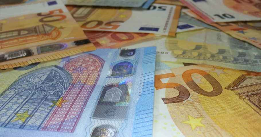 Pile of different Euro banknotes macro shot, slider motion Royalty-Free Stock Footage #1089595977