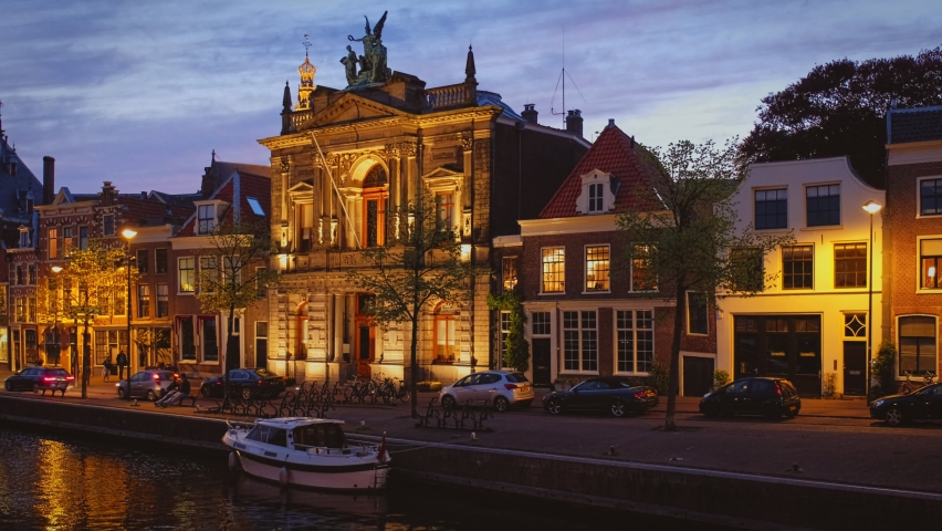 Haarlem quay of Spaarne river in the evening with medieval buildings. Haarlem, Netherlands