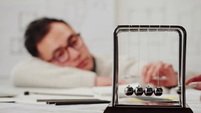 Tired Korean architect designer sleeping. Professional engineer, overworked interior creator relaxing after working with new house project, blueprint plan, drafting building. - Powered by Shutterstock - Get 15% off with code: PIKWIZARD15