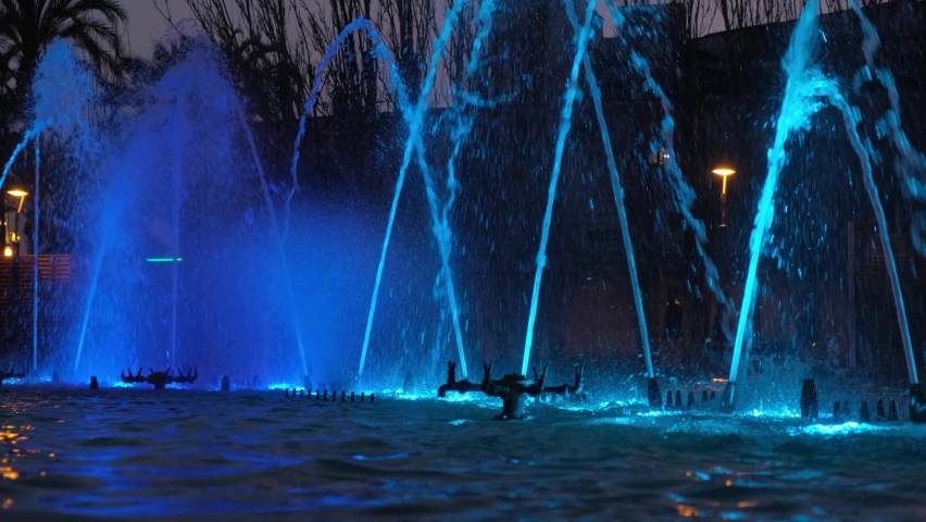 Beautiful colored fountain in the night city.