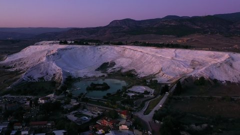 Top view of blue lake in the mountains. Panoramic view of lake near travertines of Pamukkale, Turkey. Beautiful nature view.