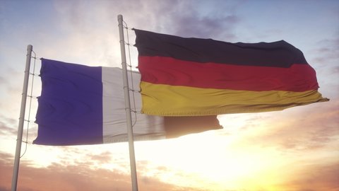 France and Germany flag on flagpole. France and Germany waving flag in wind. France and Germany diplomatic concept