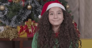 Caucasian brazilian girl, curly hair, christmas clothes. come, come, invitation, inviting, welcome. Christmas, Merry Christmas. 4K 60fps Premium cinematic video.