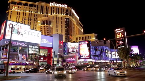 Las Vegas, USA - January 2016 : Facade of the Planet Hollywood Las Vegas at night, a hotel and casino located on the Las Vegas Strip with some traffic, in Nevada, US