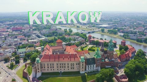 Inscription on video. Krakow, Poland. Wawel Castle. Ships on the Vistula River. View of the historic center. Glitch effect text, Aerial View