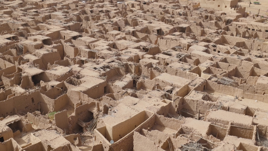 Aerial view of the Old Town mud hut houses in the tourist area of Al Ula, Saudi Arabia Royalty-Free Stock Footage #1089618665