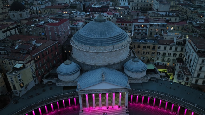 aerial view of Piazza del Plebiscito in Naples, Italy, at night, illuminated central square in Naples, famous tourist destination in southern Italy. High quality 4k footage