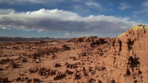 Cinematic aerial to the National Park Utah, red rocky spires, natural phenomena, landscape of another planet, scenic Utah. Drone footage