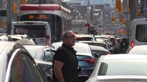 Toronto, Ontario, Canada April 2022 Epic traffic and transit gridlock in downtown Toronto city streets