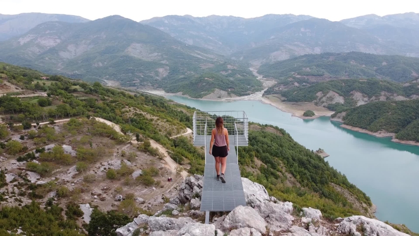 Woman Walks the Stairs at Viewpoint Lake Bovilla, Albania - Dolly Follow Behind